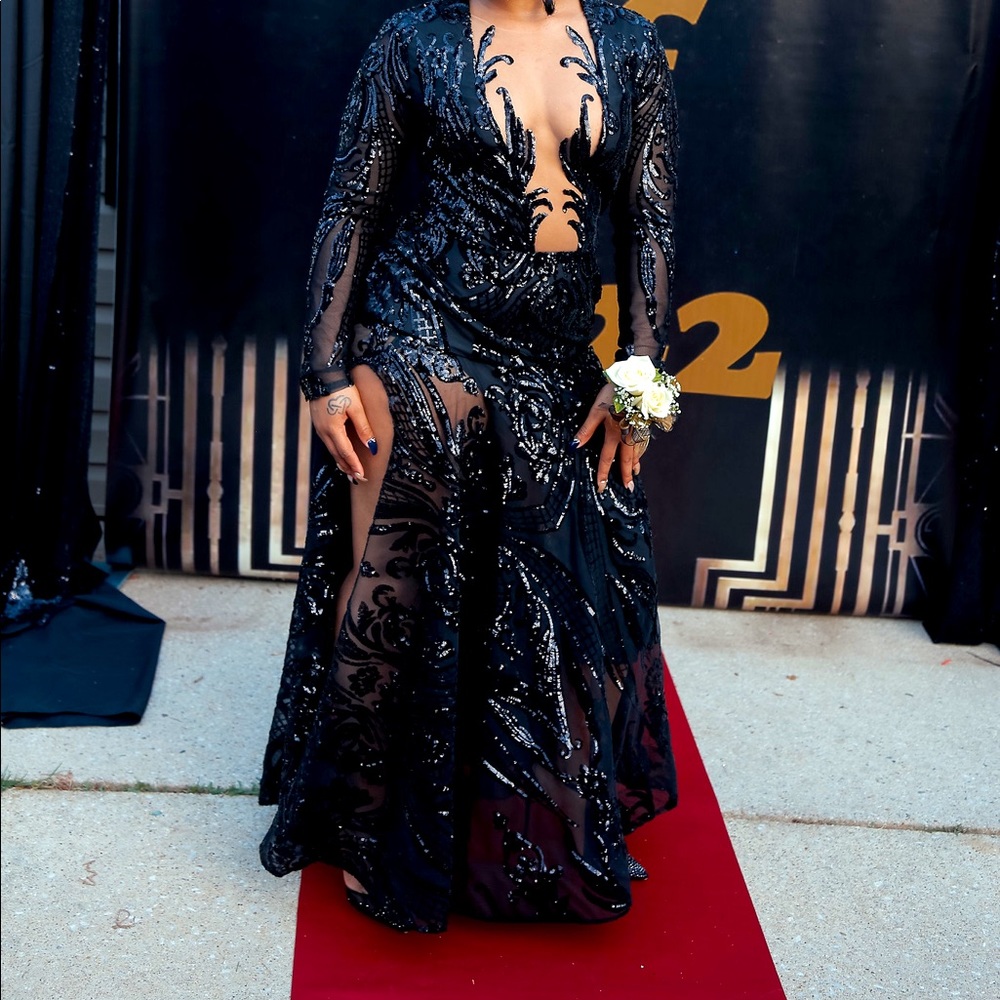 This is a prom dress only worn once on june 1st it's a custom made